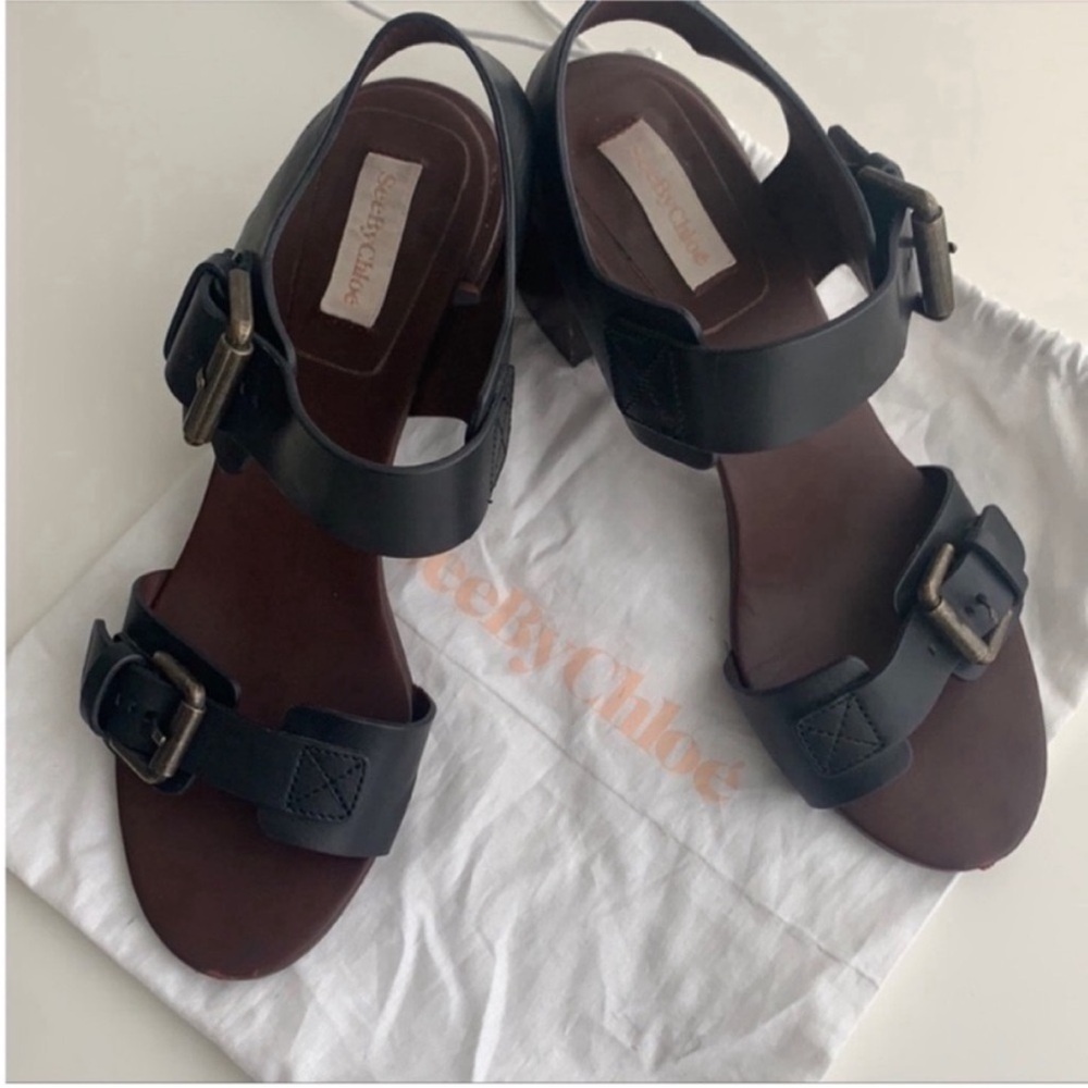See By Chloe Black Leather Brass Buckle
Block Heel Chunky Sandals 39 1/2
$68 490